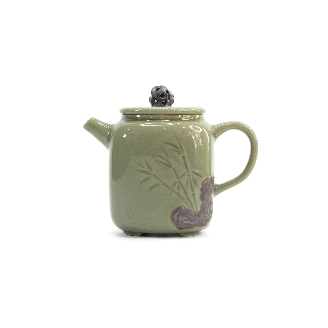 Celadon Teapot with Combined Relief and Incised Carving
