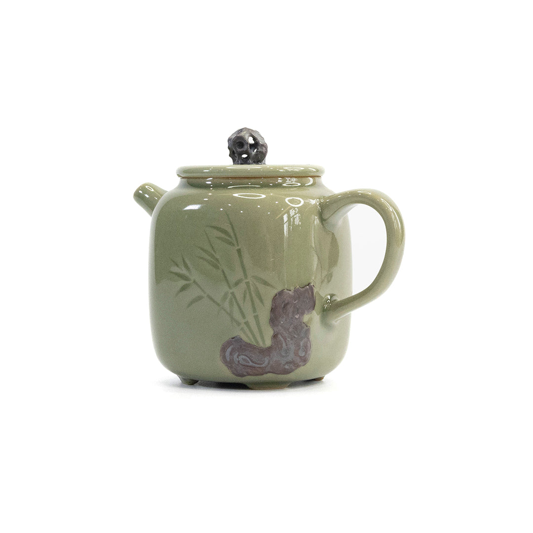 Celadon Teapot with Combined Relief and Incised Carving