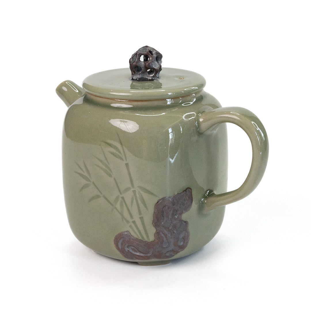 Celadon Teapot with Combined Relief and Incised Carving
