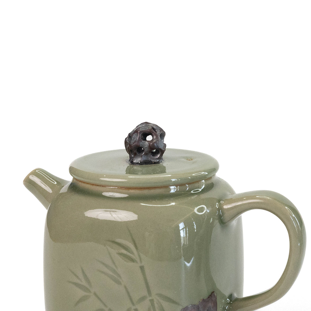 Celadon Teapot with Combined Relief and Incised Carving