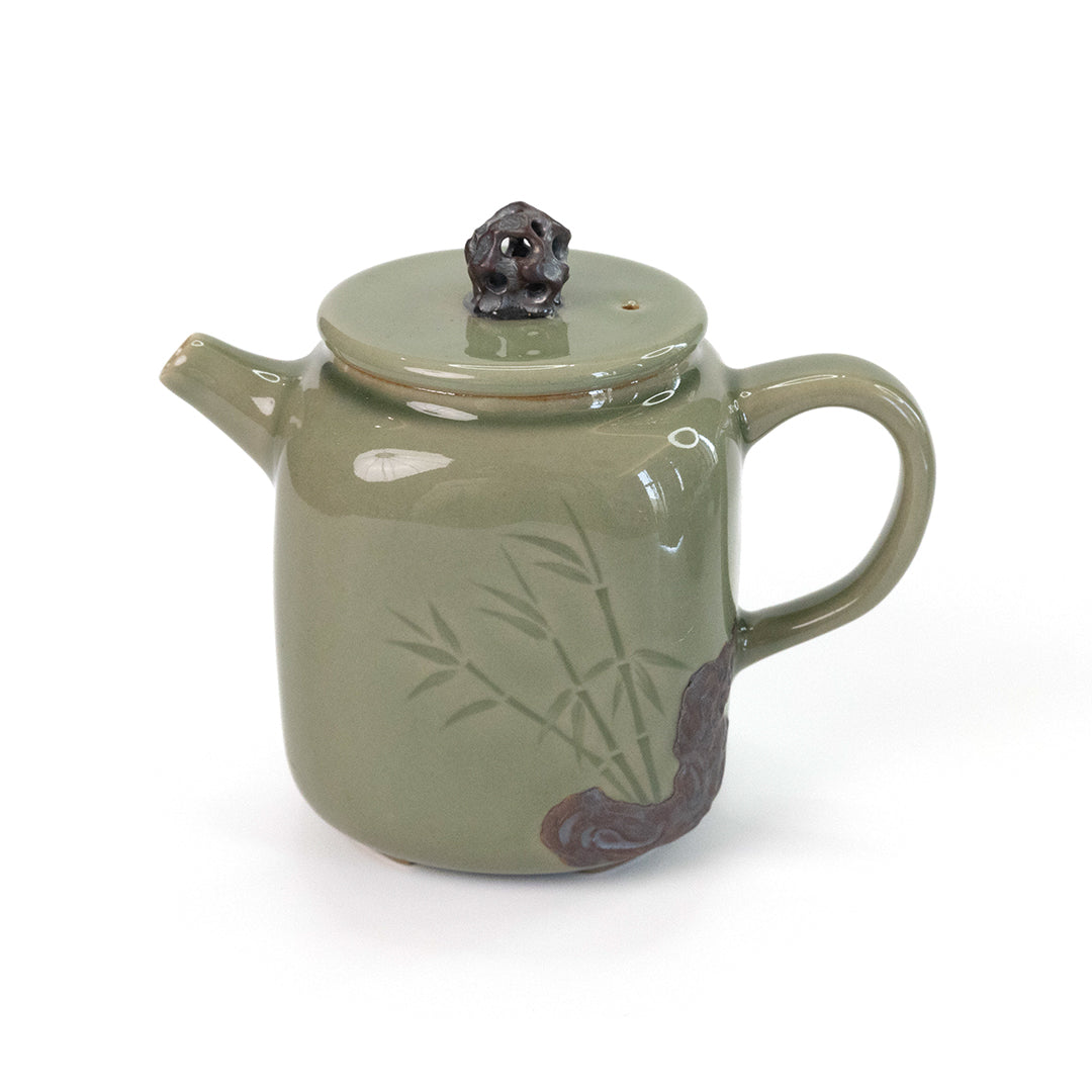 Celadon Teapot with Combined Relief and Incised Carving