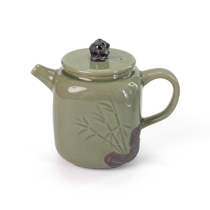 Celadon Teapot with Combined Relief and Incised Carving