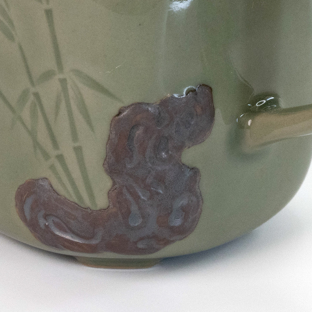 Celadon Teapot with Combined Relief and Incised Carving