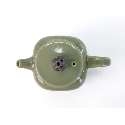 Celadon Teapot with Combined Relief and Incised Carving